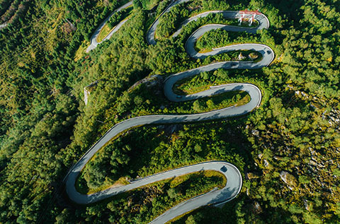 Aerial view of serpentine road in mountains